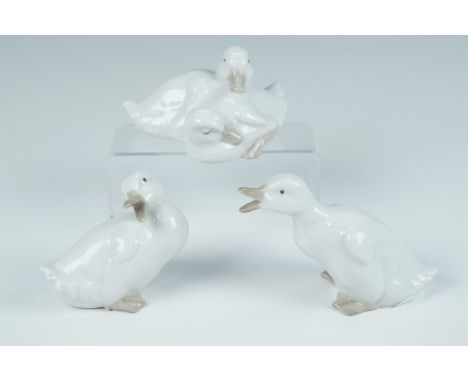 Three Nao goose figurines