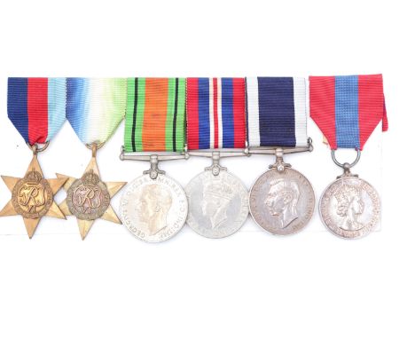 A Second World War campaign medal group with George VI Royal Navy Long Service and Good Conduct Medal and QEII Faithful Servi