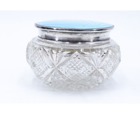 An Art Deco guilloche enamelled silver and cut glass powder pot, the lid having a gilt interior, Birmingham, 1932, cover 96.8
