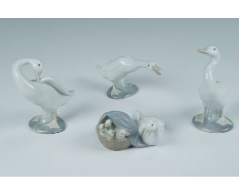 Four Lladro goose figurines