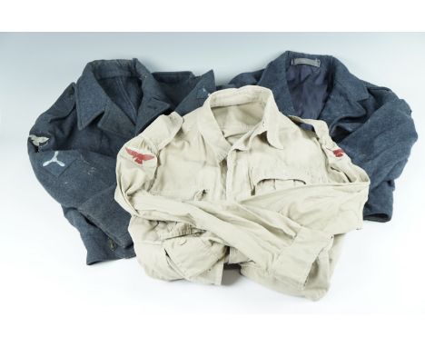 A 1940s RAF Battledress type blouse together with a post-War example and an RAF Bush Shirt