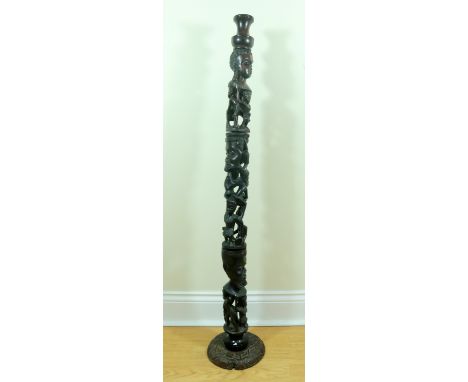 An African carved hardwood standard lamp, three sections, 117 cm