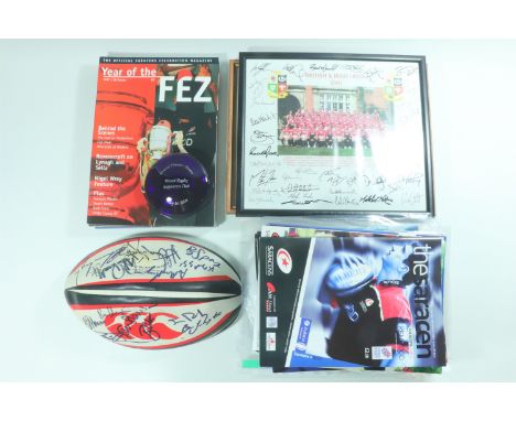 A large quantity of rugby memorabilia, including match day programmes and tickets, signed rugby ball, framed Saracens players