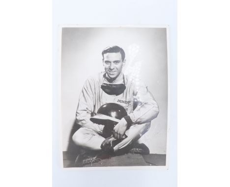 An autographed promotional portrait photograph of racing driver Jim Clarke OBE (1936 - 1968), 8" x 6"