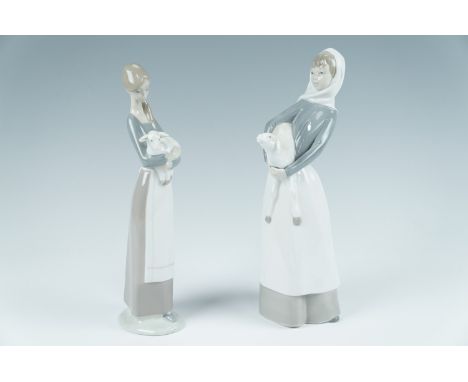 Two Lladro figurines, young girls with lambs