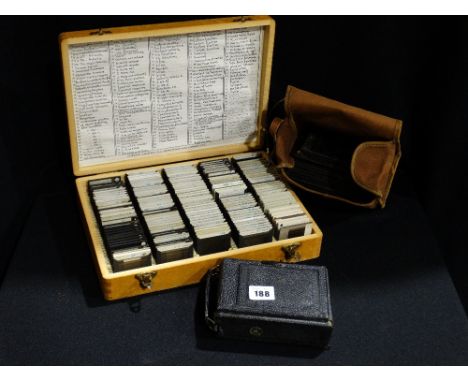 A Vintage Ensign Folding Camera & Plates Together With A Box Of Photographic Slides