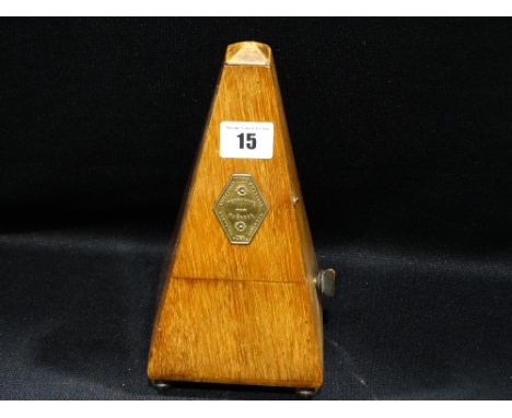 A Mahogany Encased Metronome