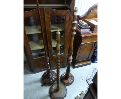 Two Turned Mahogany Standard Lamp Bases, one with tulip shaped base together with another Standard Lamp Base with Barley Twis