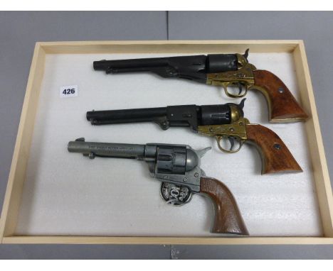 Three Replica Revolvers - Colt Single Action Army .45 Revolver, Small Barrel Navy Colt Revolver and a Long Barrel Navy Colt R