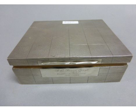 Large silver cigarette box with engine turned decoration