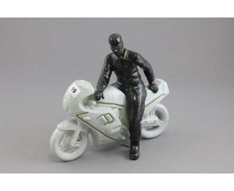 Contemporary ceramic model of man on motorcycle