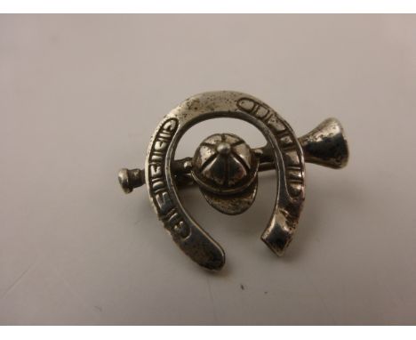 Silver Brooch in the form of a Horse Shoe, Hunting Horn and Riding Hat