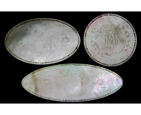 A collection of forty-seven early 19th century mother of pearl gaming counters, each engraved with DH monogram within a folia