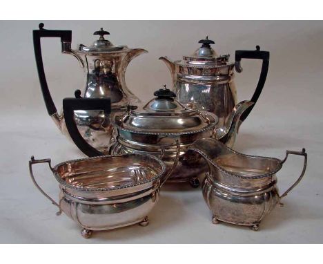 A George VI five-piece silver tea and coffee service of compressed oval form, the teapot, coffee pot and water jug with hinge