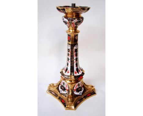 A large late 20th century Royal Crown Derby candlestick decorated in the Imari pattern, No. 1128, adapted for electric fittin