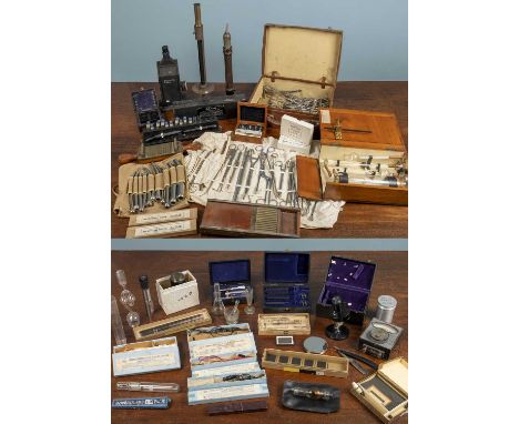 A group of scientific and medical instruments to include a pill roller, two microtome knives, a cased carbon dioxide apparatu
