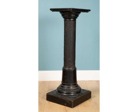 A black pillar stand, carved wood with designs to the stand, 115cm h x 41cm wUsed condition with marks consistent with age an