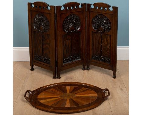 A large specimen wood tray, veneered woods, handled, 46cm h x 72cm w, together with an oak firescreen, carved with foliage, t