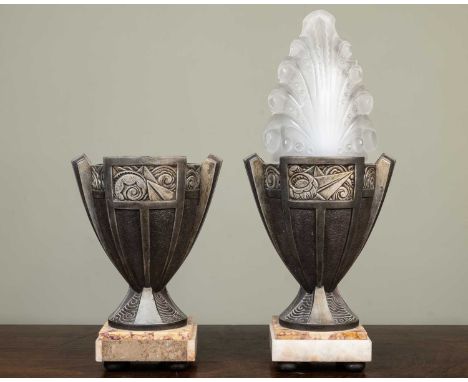 A pair of French style lamp bases, both on a raised marble style stand, each 24cm high (2)Used condition. PAT tested. Only on