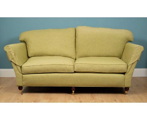 A green flecked sofa, mahogany, with squared mahogany back legs and ball rounded castor legs to the front, 194cm w x 90cm d x