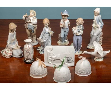 A group of Lladro items consisting of six various figurines; three bells; a small vase; a goose; and an advertising plaque; t