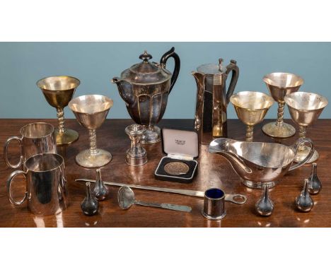 An assortment of silver plated ware comprising of a teapot, one smaller Mappin and Webb teapot, one Mappin and Webb gravy boa