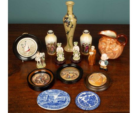 A small group of ceramics to include a Moorcroft vase; a Doulton John Barley Corn jug; a Royal Worcester porcelain candle snu