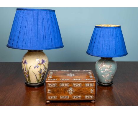 Two modern table lamps decorated with flowers, the largest 33cm high; together with a Victorian walnu workbox with decorative