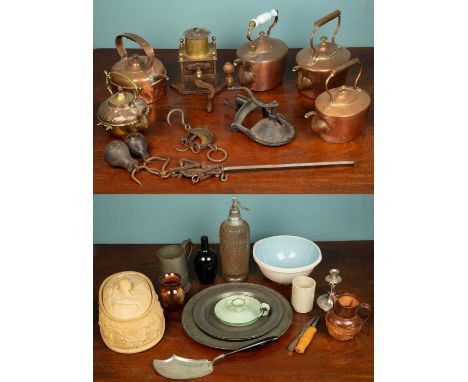 An assortment of miscellaneous items to include five copper teapots, two pewter plates, one pewter tankard, one vintage green