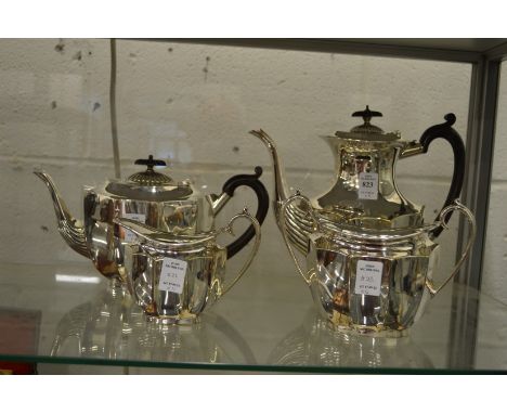 A plated four-piece tea service.