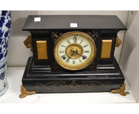 A Victorian mantel clock.