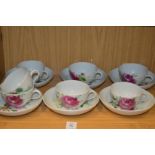 A set of six continental floral decorated cups and saucers.