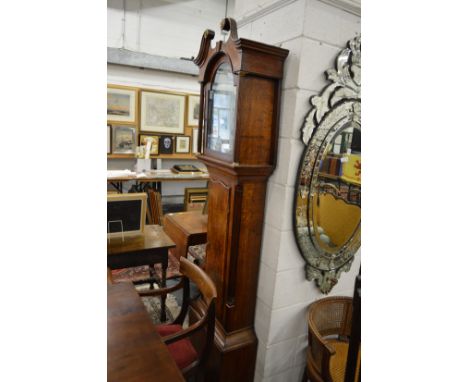 A 19th century oak longcase clock with painted arched dial.