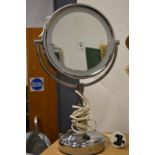 A magnifying illuminated makeup mirror.