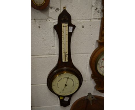 A barometer/thermometer.