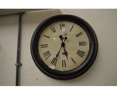 A wall clock.