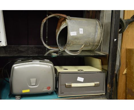 An old watering can, projectors, projector screens etc.