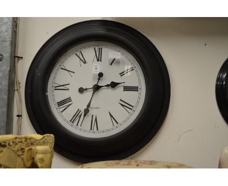 A wall clock.