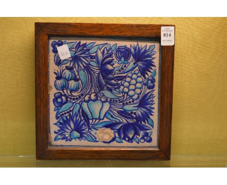 A framed Turkish pottery tile.