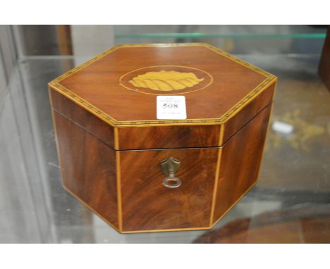A Georgian style mahogany and satinwood tea caddy.