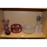 Cut glass bowls, a vase, a pair of candlestick and a claret jug.