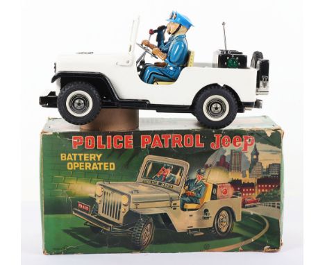 Nomura TN (Japan) Tinplate Battery Operated Police Patrol Jeep, white body, lithographed tinplate police man, spare wheel, je