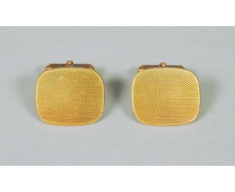   Manschettenknöpfe mit Gravur  Manschettenknöpfe mit Gravur   14 K Gelbgold. Paar Manschettenknöpfe mit feiner Gravur. Guter