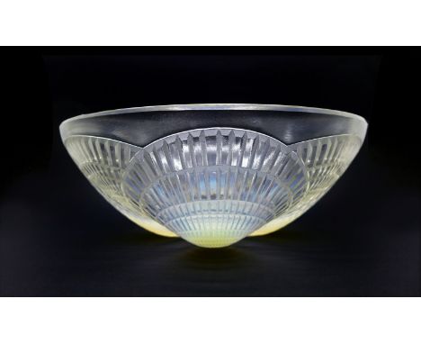 A Lalique opalescent glass bowl, Coquilles pattern, signed R. Lalique France to base, 24cm 