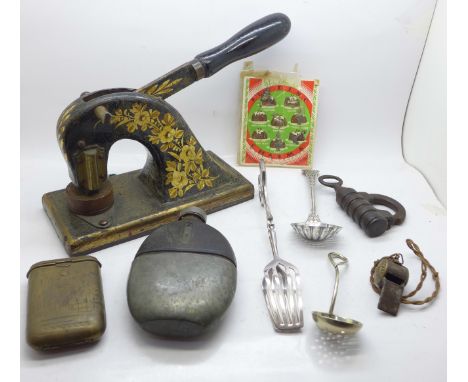 A lock, a desk stamp, a hip flask, a whistle, Christmas pudding charms, a case and flatware 