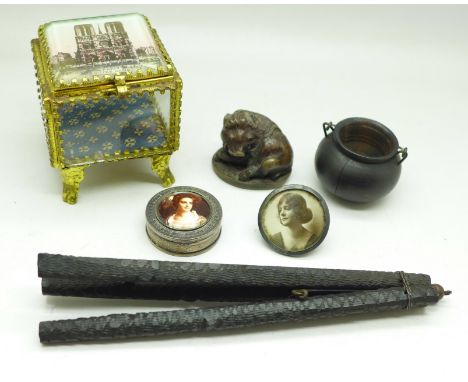 A jewellery casket, a pill box, photograph frame, netsuke and a pot and stand 