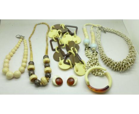 Five necklaces, a bangle and a pair of earrings 