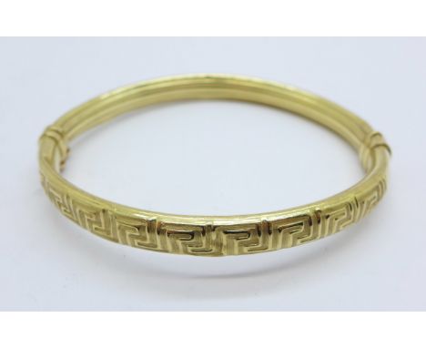 A 14ct gold bangle, 8.6g, a/f, dented 