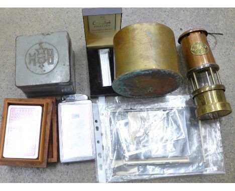 WWI trench art, two lighters including Colibri, a collection of photographs, miner's lamp, playing cards, etc. 