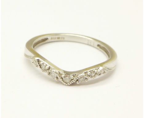 A 9ct white gold and diamond ring, 1.4g, K 